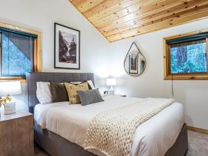 Ένα ή περισσότερα κρεβάτια σε δωμάτιο στο AlpenView