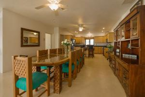 a dining room and kitchen with a table and chairs at The Queen of Cozumel Beach House -Luxury Beachfront Villa- MILLION DOLLARS VIEW in Cozumel