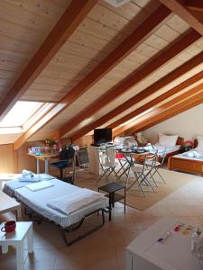 A television and/or entertainment centre at AB Preveza Apartments -15 Meters Over the Sea
