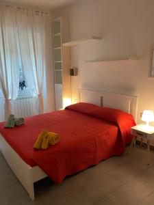 Il Giardino Nascosto tesisinde bir odada yatak veya yataklar