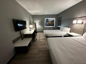 Postel nebo postele na pokoji v ubytování Days Inn & Suites by Wyndham Summerside