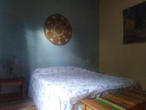 Katil atau katil-katil dalam bilik di Casa Nômade