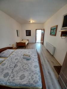 Postel nebo postele na pokoji v ubytování Bed & Breakfast Helena