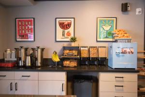 a kitchen with a counter top with fruit on it at Samesun San Francisco in San Francisco