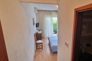 Postel nebo postele na pokoji v ubytování Apartments and rooms with parking space Supetar, Brac - 5658