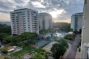 a view of a city with tall buildings at Apartamento por temporada RJ próximo ao Riocentro, Parque Olímpico e Jeunesse Arena in Rio de Janeiro