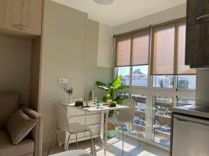 Кухня или кухненски бокс в Apartamentos Naciones Playa, La Paloma