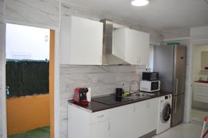 Kuchyň nebo kuchyňský kout v ubytování Vialia Apartments