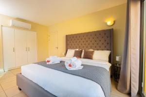 Letto o letti in una camera di Droom appartement met uitzicht op de jachthaven