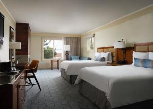Postel nebo postele na pokoji v ubytování Hotel Abrego