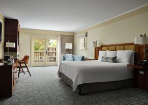 Postel nebo postele na pokoji v ubytování Hotel Abrego