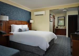 Postel nebo postele na pokoji v ubytování Hotel Abrego