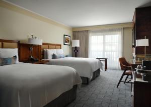 Postel nebo postele na pokoji v ubytování Hotel Abrego