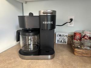 a coffee maker sitting on top of a counter at Sandpiper Shores in Florence