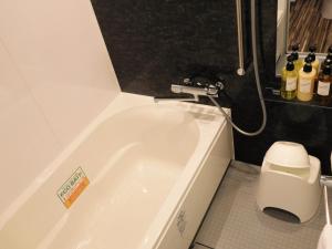 Baðherbergi á Henn na Hotel Laguna Ten Bosch