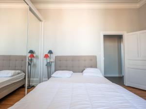 Posteľ alebo postele v izbe v ubytovaní Appartement Haut de Gamme Centre-Ville, 50m Plage, Parking Privé, 4 Couchages - FR-1-197-552
