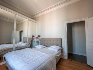 Posteľ alebo postele v izbe v ubytovaní Appartement Haut de Gamme Centre-Ville, 50m Plage, Parking Privé, 4 Couchages - FR-1-197-552