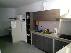 Kuchyň nebo kuchyňský kout v ubytování Albergue @ Muxia + 18 fotografií