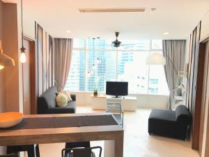 Μια τηλεόραση ή/και κέντρο ψυχαγωγίας στο Vortex Suites KLCC by G