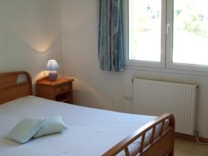 Ένα ή περισσότερα κρεβάτια σε δωμάτιο στο Domaine La Fontaine Du Cade +77 φωτογραφίες