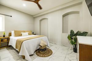 Voodi või voodid majutusasutuse EVA Resort toas