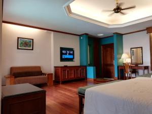 TV o dispositivi per l'intrattenimento presso Wonderland Private Pool Villas at Port Dickson