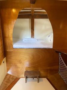 a small room with a bed on a boat at Veliero in Legno in Bisceglie