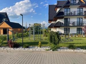 Vonkajšia záhrada v ubytovaní Apartament w Białce Tatrzańskiej