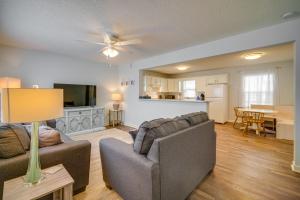a living room with two couches and a kitchen at Pet-Friendly Villas Vacation Rental Walk to Bay in Rio Grande
