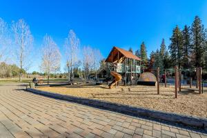 a playground with a slide in a park at Old Mill Lookout in Bend