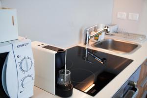 A cozinha ou cozinha compacta de Lex Home in a Luxury Hotel