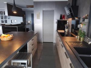 cocina grande con encimera en Villa 10 p.Brando 170 m2 vue mer panoramique en Brando
