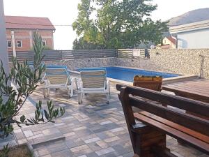 Patio alebo iná vonkajšia časť ubytovania Holiday Home in Senj with Pool near Beach