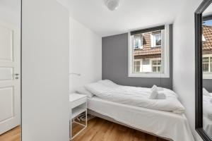 Ліжко або ліжка в номері Family friendly 3BR - Fast Wi-FI - Behind Bryggen