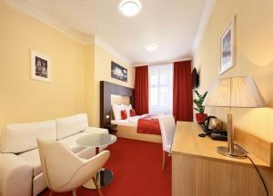 Ein Bett oder Betten in einem Zimmer der Unterkunft Martin Hotel Prague