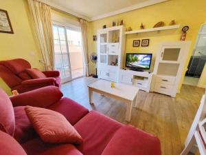TV a/nebo společenská místnost v ubytování Boliches House! Beach 200m Wifi