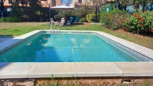 Der Swimmingpool an oder in der Nähe von Apartments in Villa Isabel