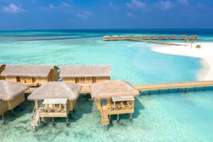 an aerial view of a resort in the water at You & Me Maldives - Adults Only - Premium All-Inclusive in Raa Atoll