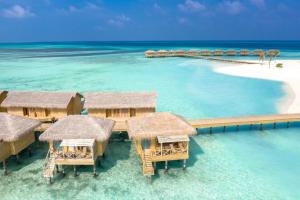 an aerial view of a resort in the water at You & Me Maldives in Raa Atoll
