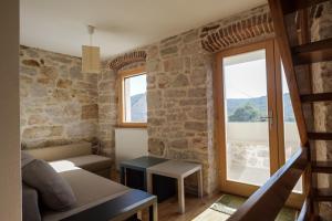 Posezení v ubytování Stone House Nana