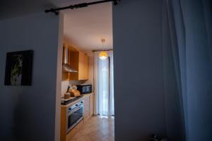 Kuchyň nebo kuchyňský kout v ubytování B&B Villa Adriana