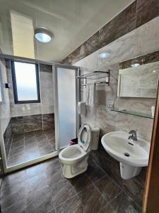 Ένα μπάνιο στο Sofa Potato Homestay