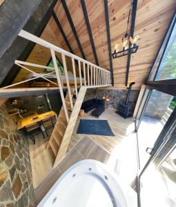 an overhead view of a room with a staircase in a house at Ayder Çalıkuşu Bungalov in Ayder Yaylasi