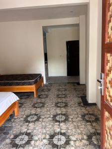 Postel nebo postele na pokoji v ubytování Gihon Bungalow