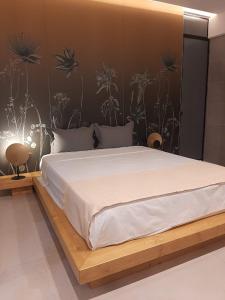 Postel nebo postele na pokoji v ubytování Sroom Apartment