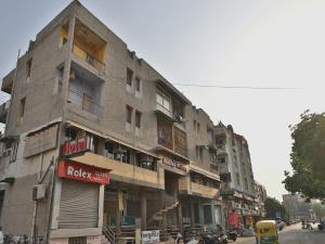 a building on the side of a city street at Hotel Maninagar Residency in Ahmedabad