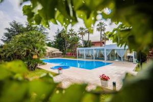 Bazén v ubytování B&B Villa Adriana nebo v jeho okolí
