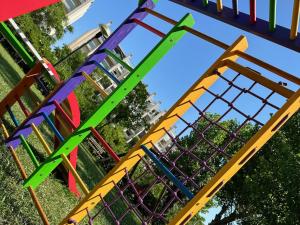 a group of colorful swings at a playground at Hotel St Gregory Park in Rimini