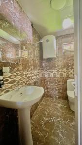 Koupelna v ubytování Guesthouse Chela