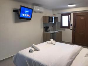 Voodi või voodid majutusasutuse Hotel Argo toas +25 fotot